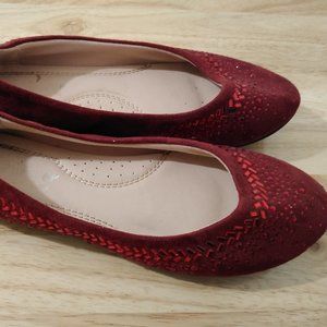 Ruby red flats with details